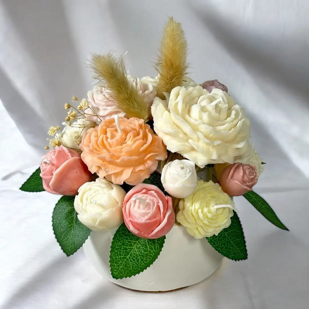 Aesthetic candle arrangement in a luxury decorated pot.
