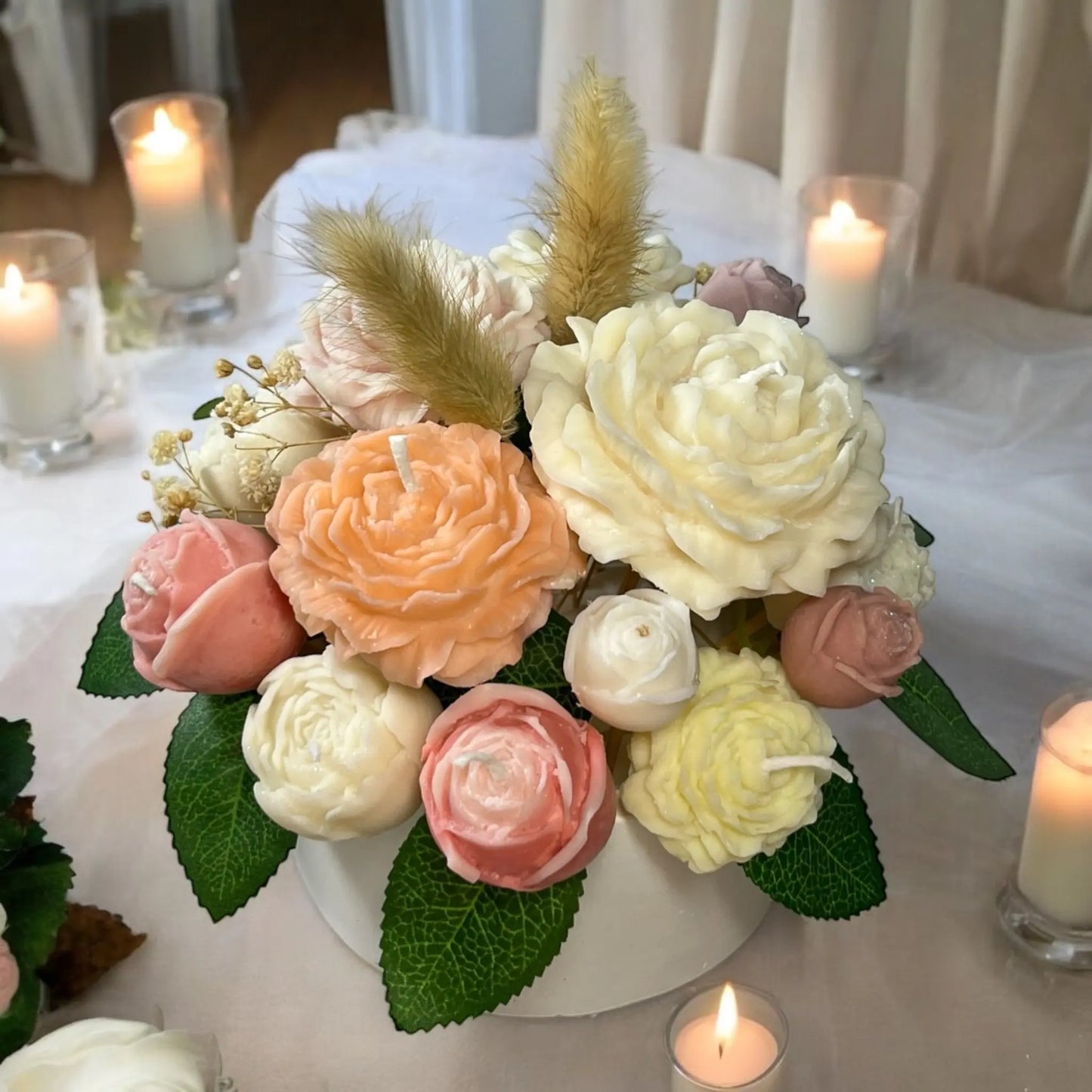 Artfully arranged candle flowers in a decorated pot for home styling.
