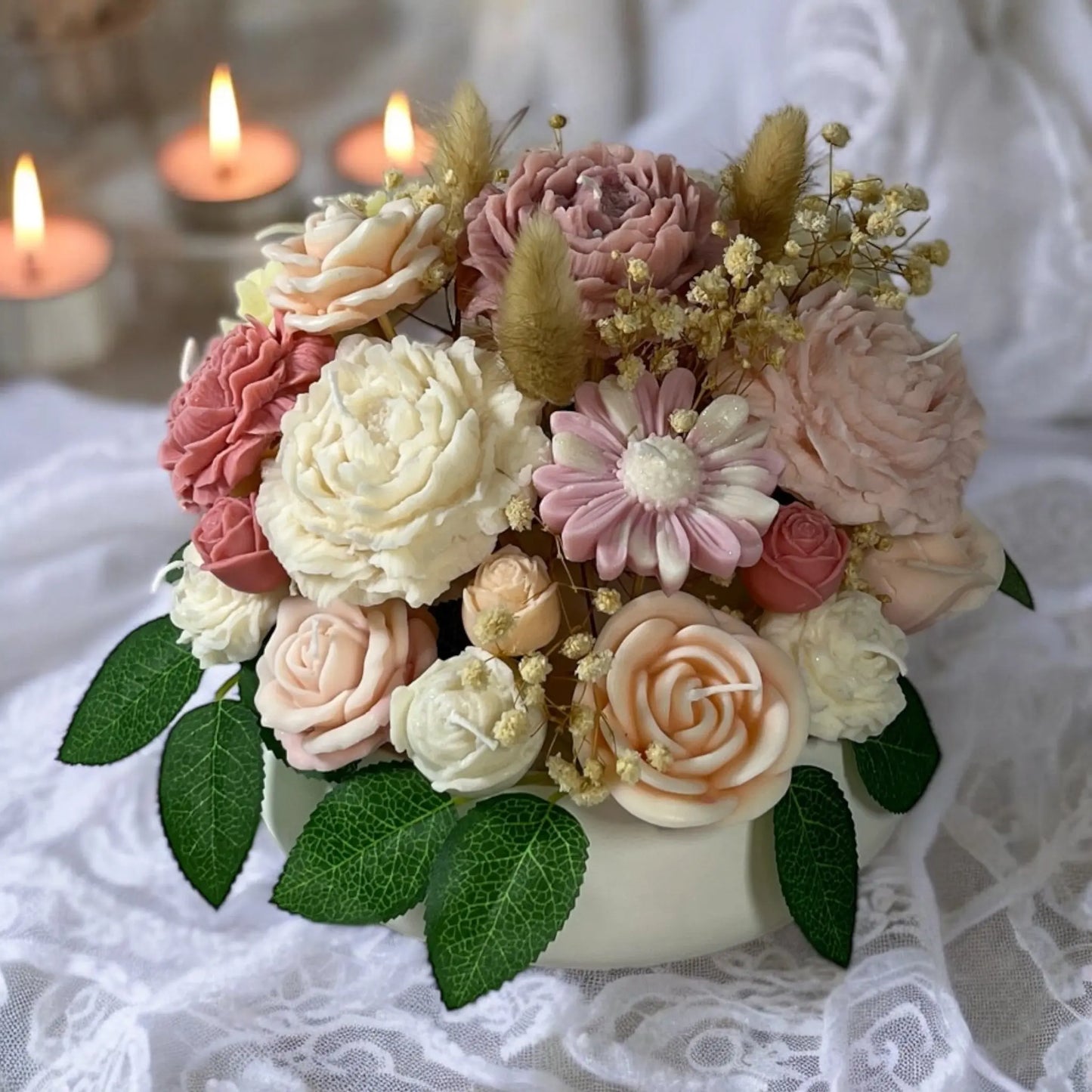 Luxurious candle bouquet in a carefully crafted decorative pot.