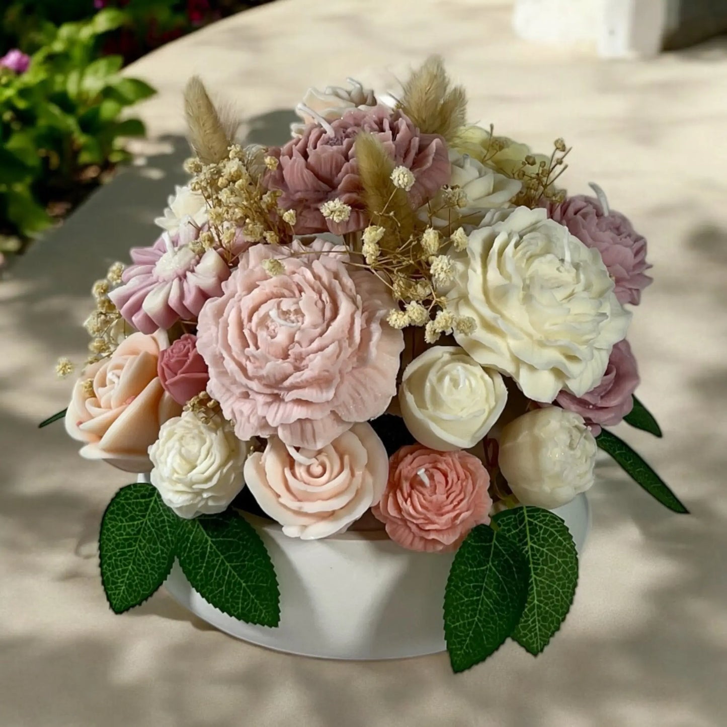Cozy home candle bouquet set in an intricate decorative pot.