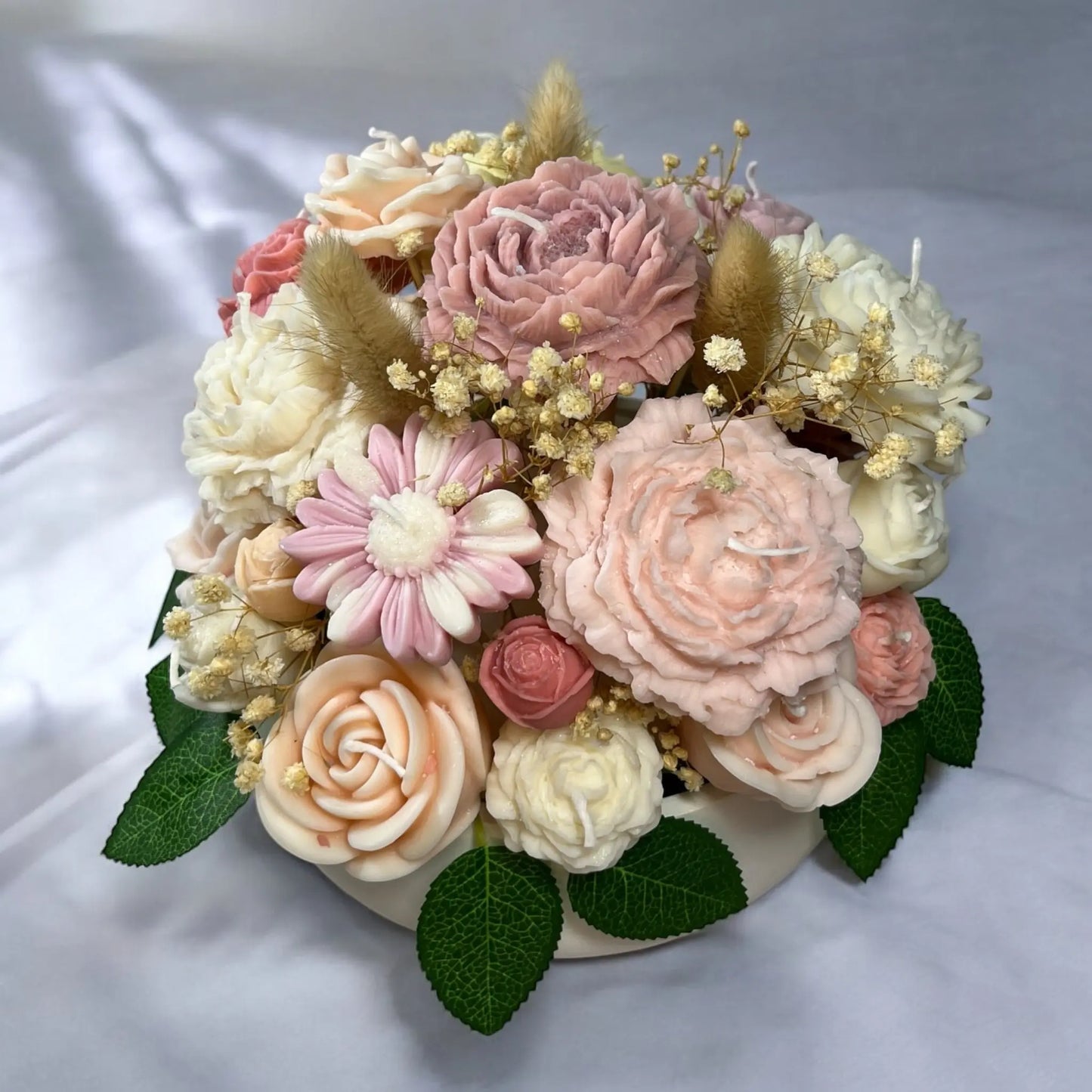 Cozy and stylish candle bouquet in a hand-designed pot.