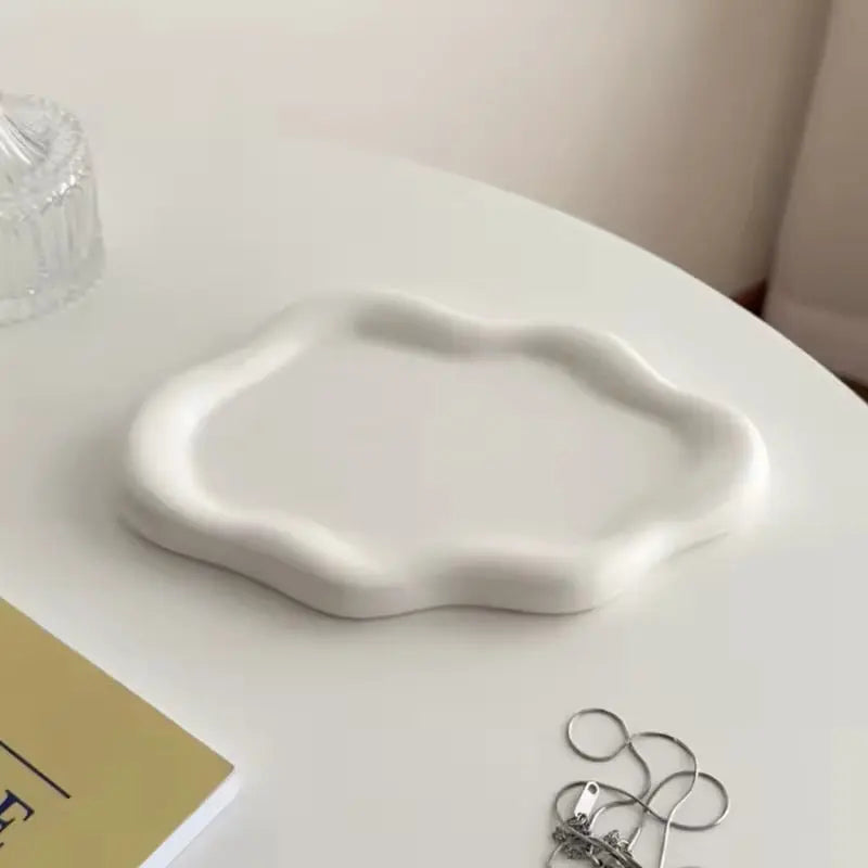 Elegant candle tray for a stylish home decor display.