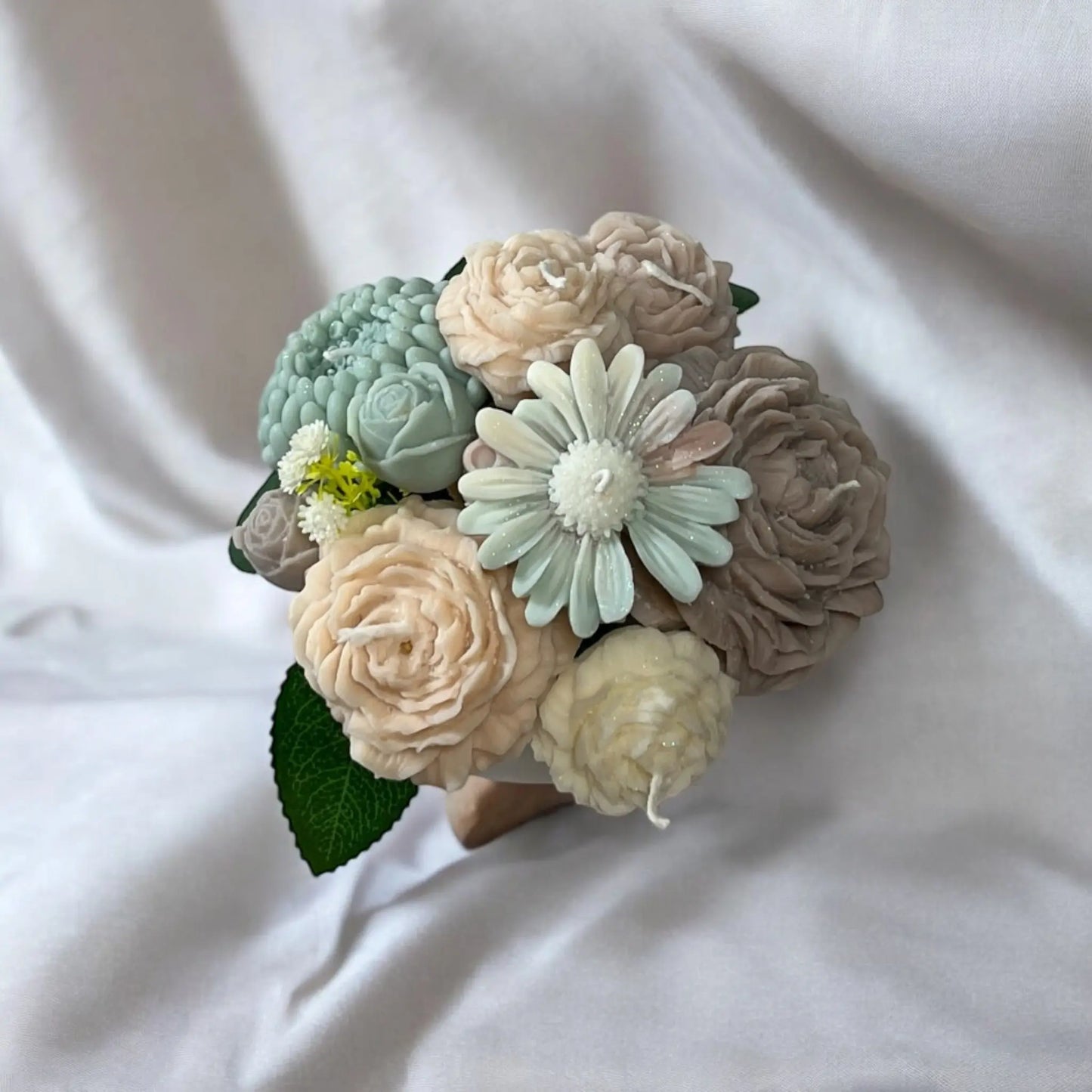 Elegant small candle bouquet inspired by fresh blooms.
