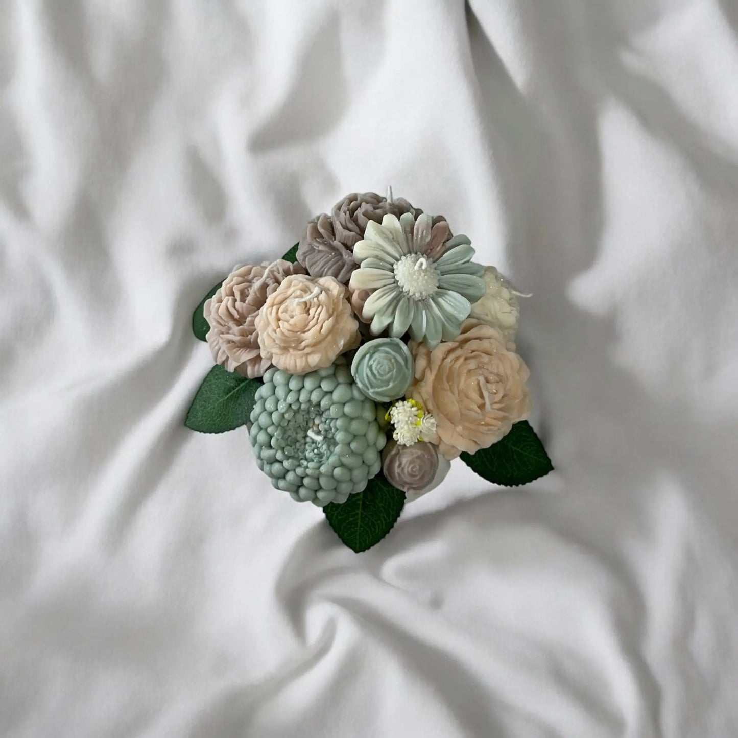 Elegant small candle bouquet inspired by fresh blooms.