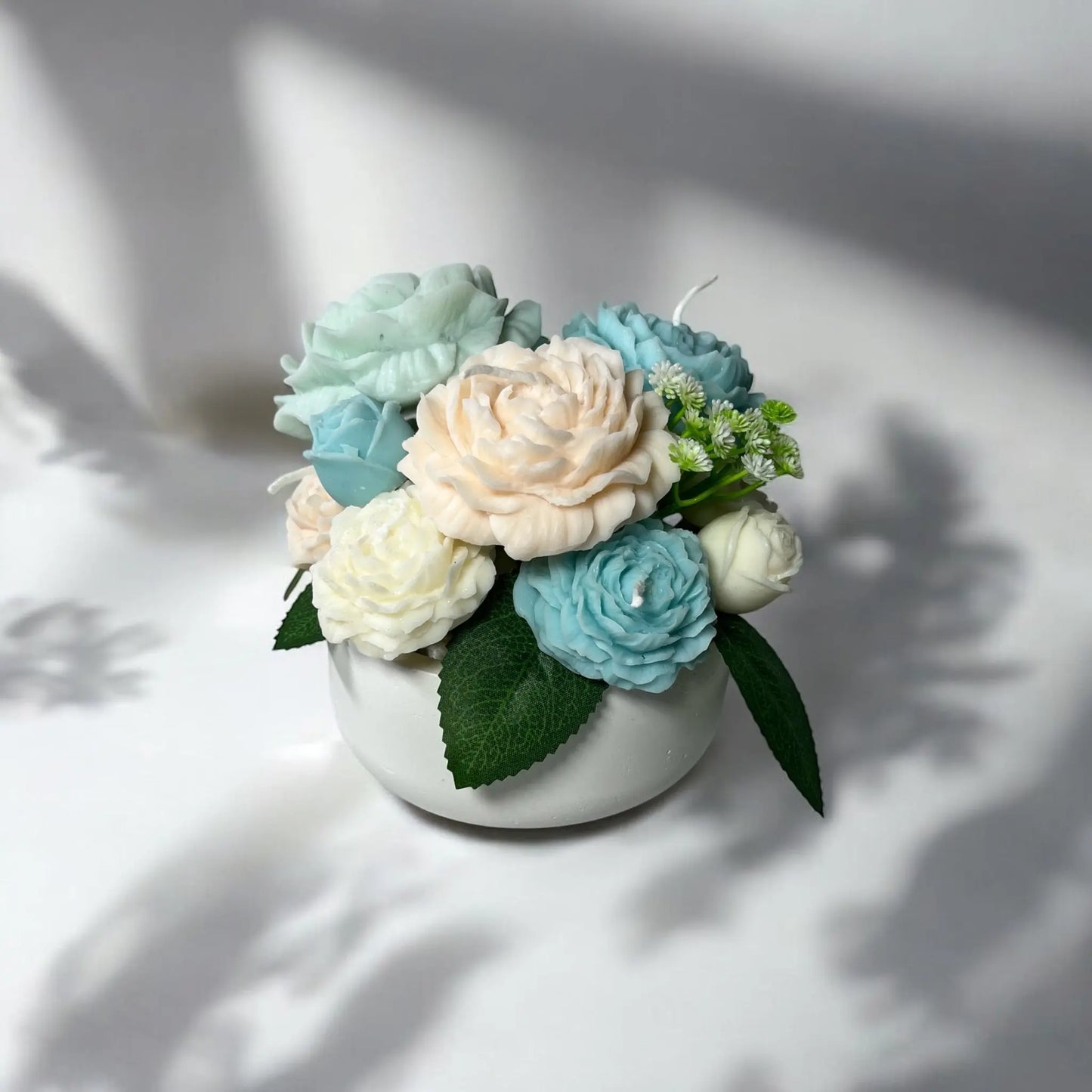 Luxurious handcrafted flower candle bouquet in a petite size.