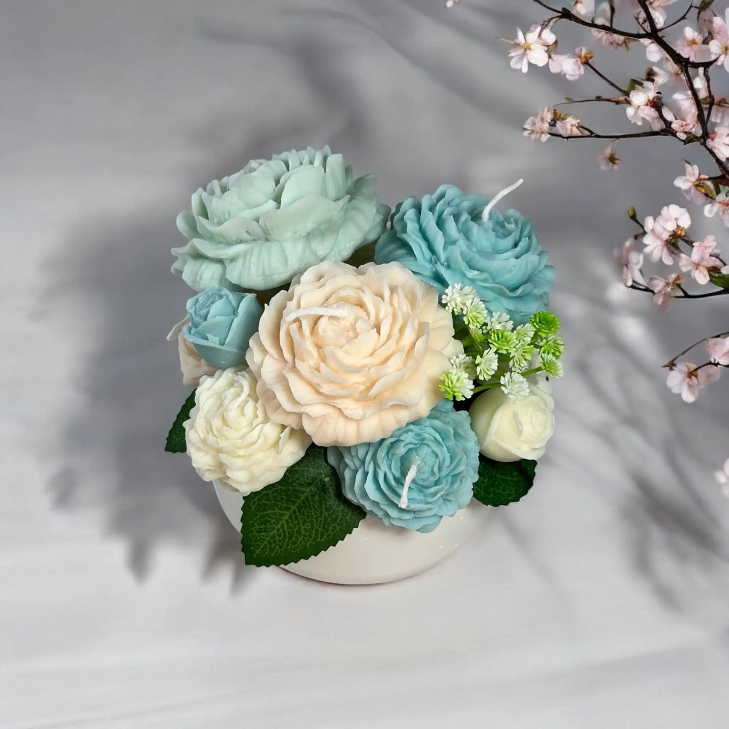 Cozy and artistic small candle bouquet with intricate petals.