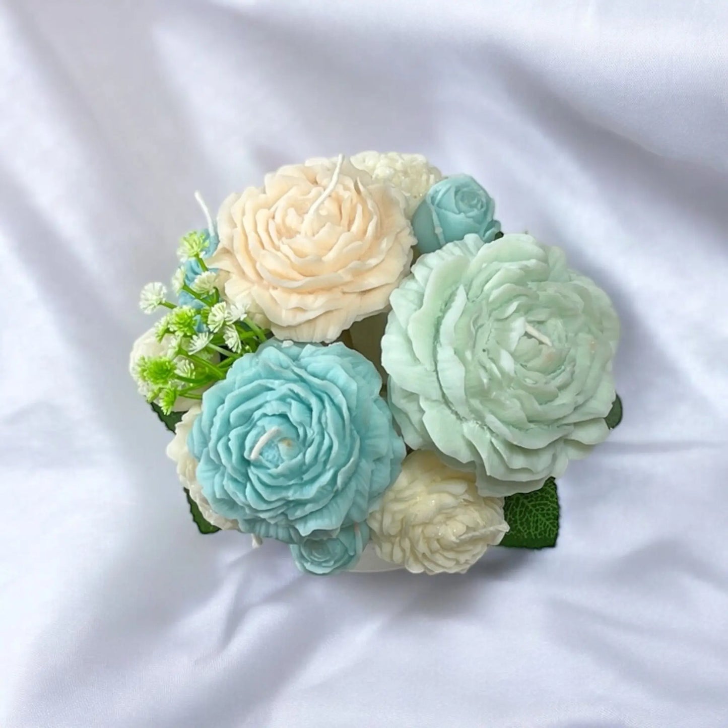 Cozy and artistic small candle bouquet with intricate petals.