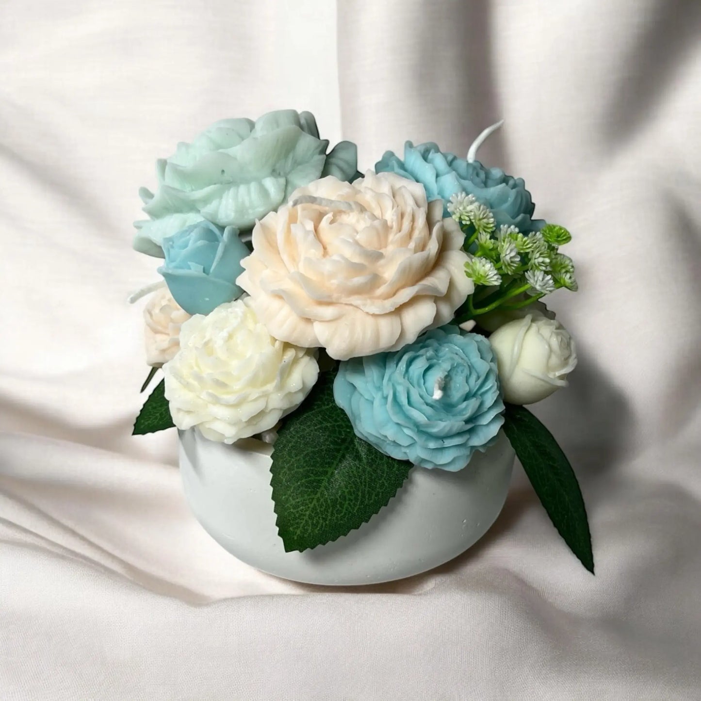 Luxurious handcrafted flower candle bouquet in a petite size.
