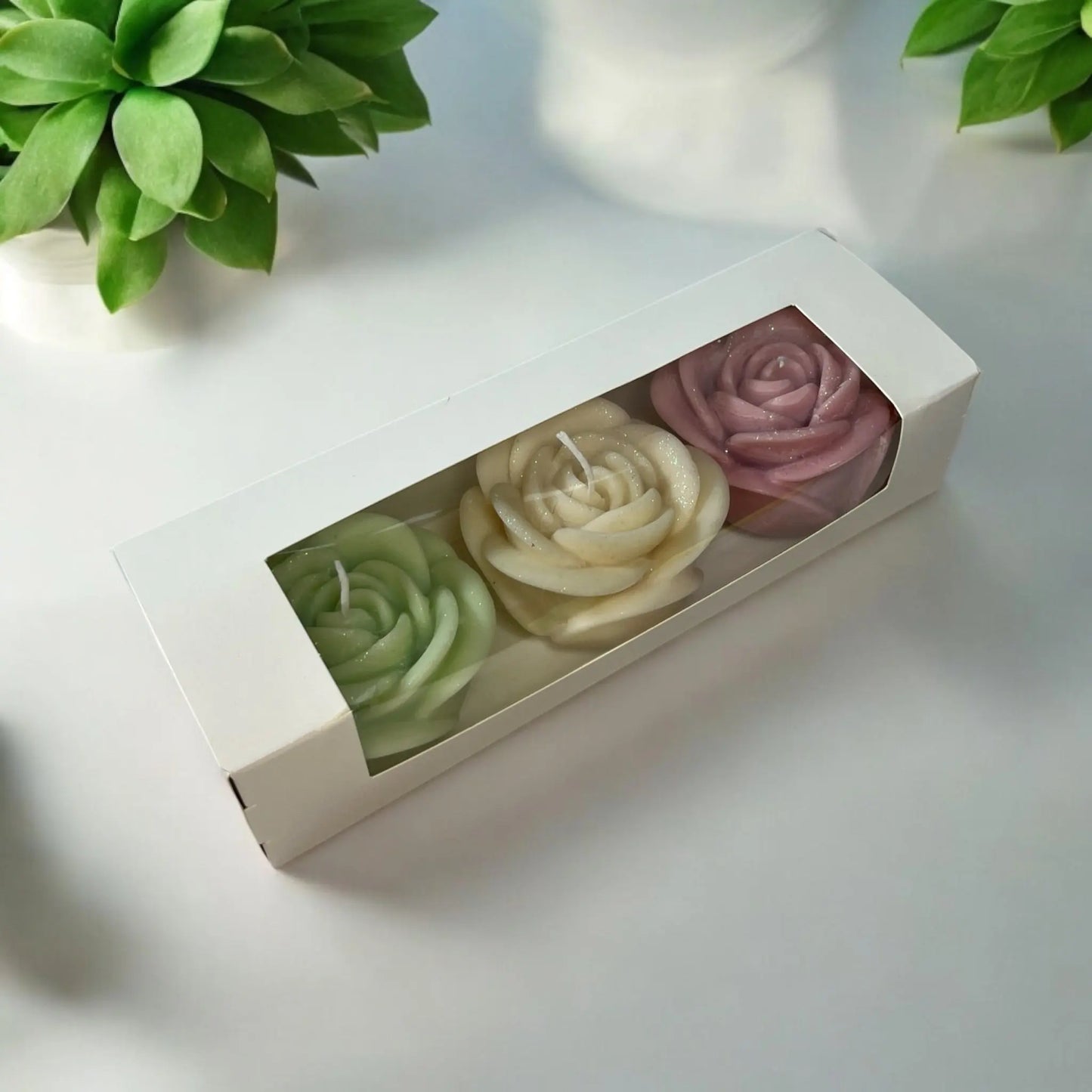 Perfect gift: a handcrafted red rose candle in a premium box.