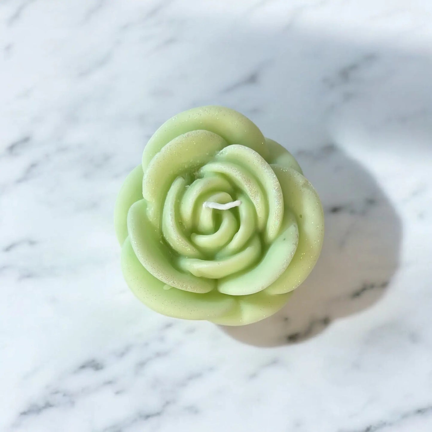 Handmade rose-shaped soy candle in elegant gift box