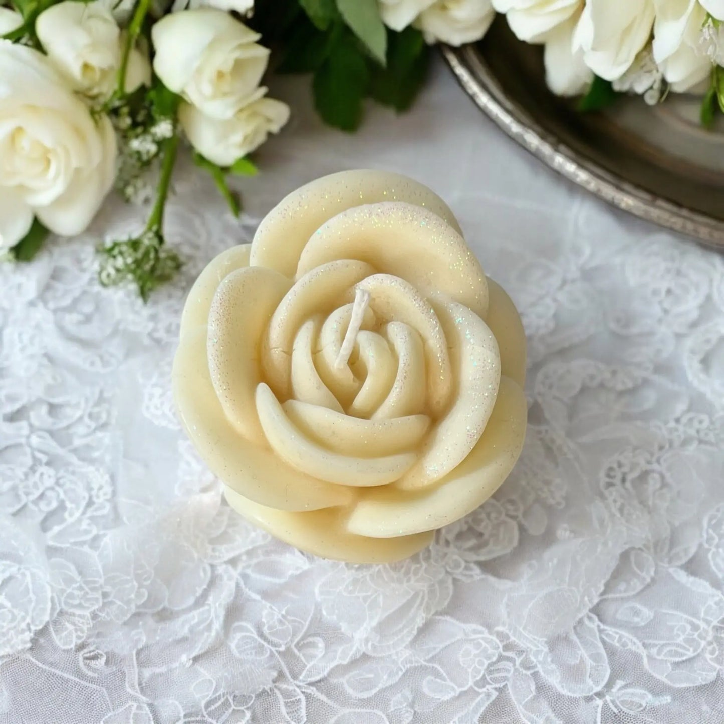Sophisticated rose candle set in a decorative box.