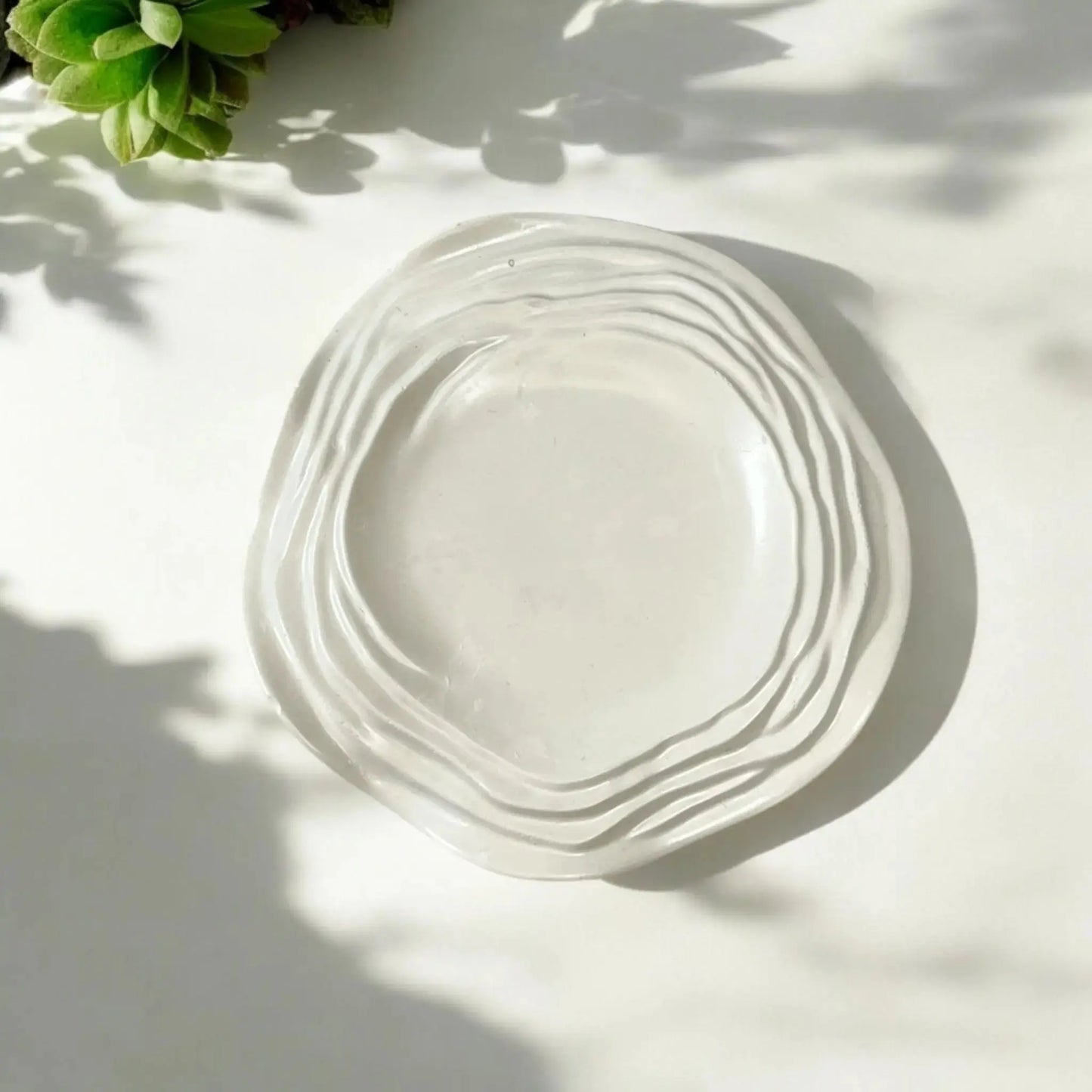 Elegant wave tray designed to complement your home decor.