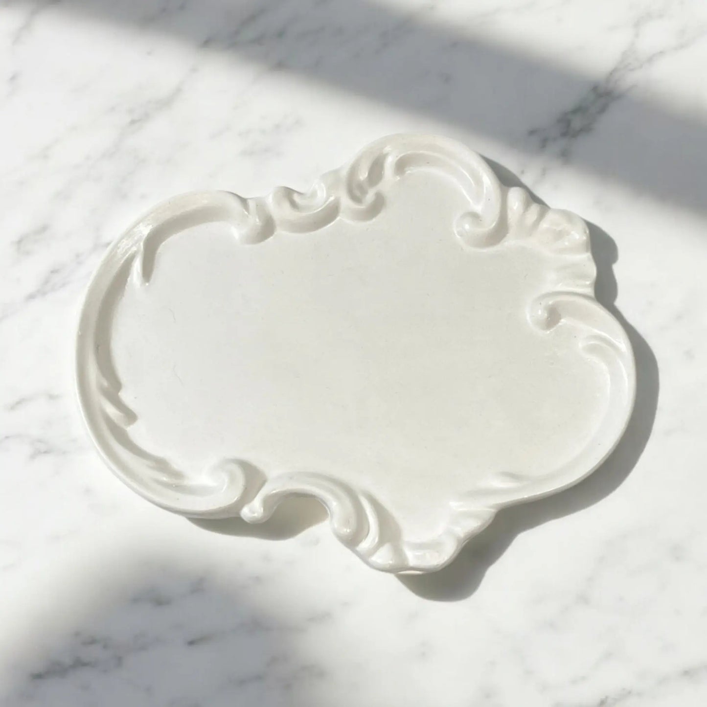 Antique-inspired home decor tray for a cozy and stylish atmosphere.