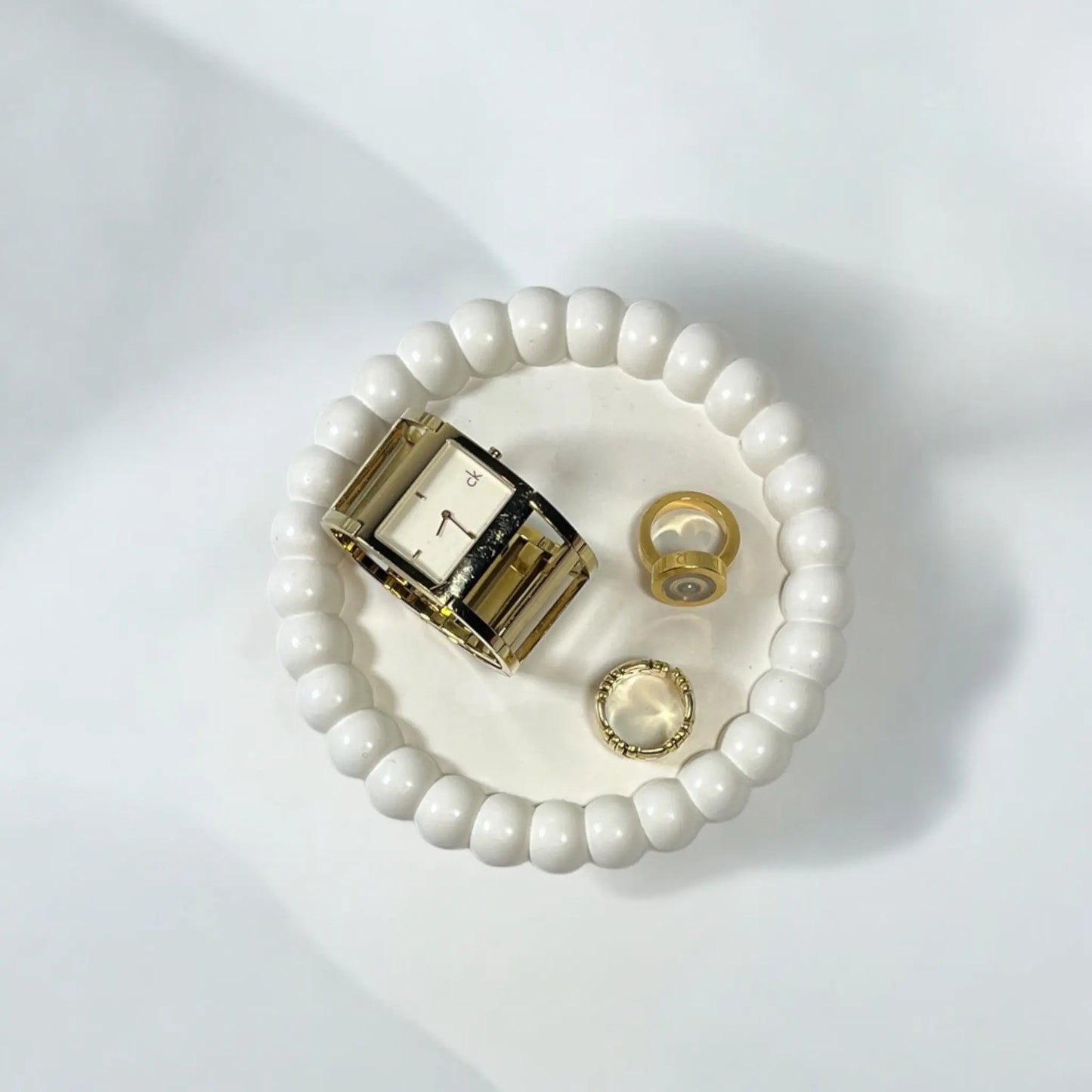 Versatile candle tray for an elegant, organized home decor display.