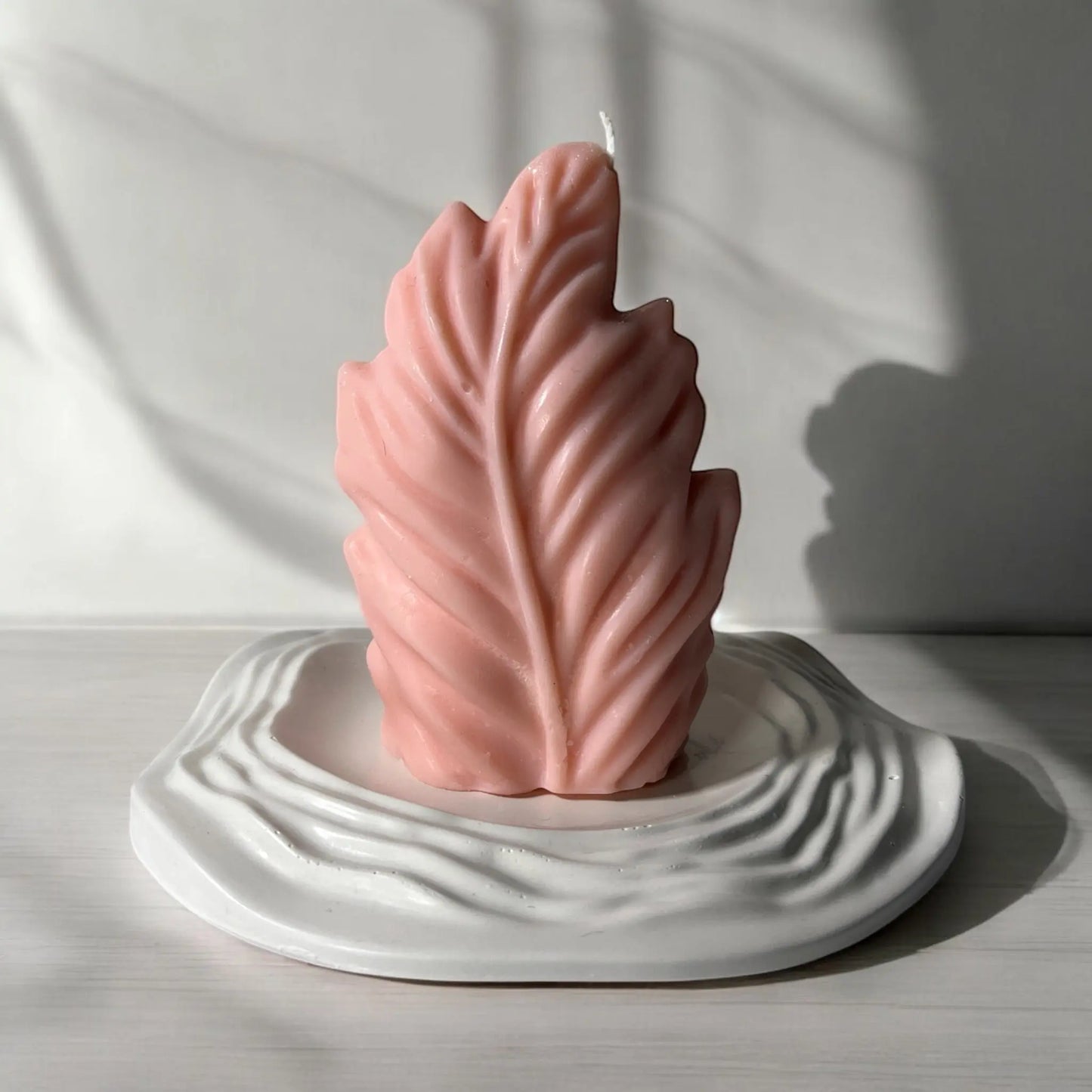 Handcrafted wave tray for a dynamic and artistic home decor accent.