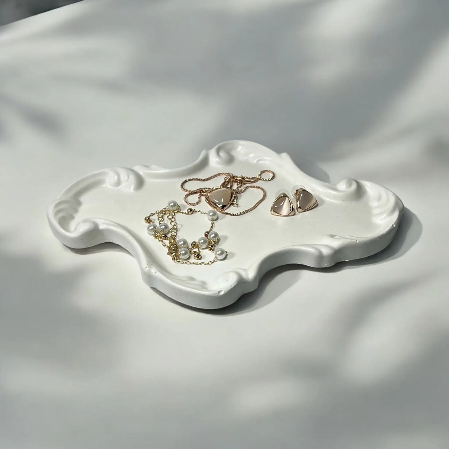 Classic decorative tray for candles, perfumes, or trinkets.