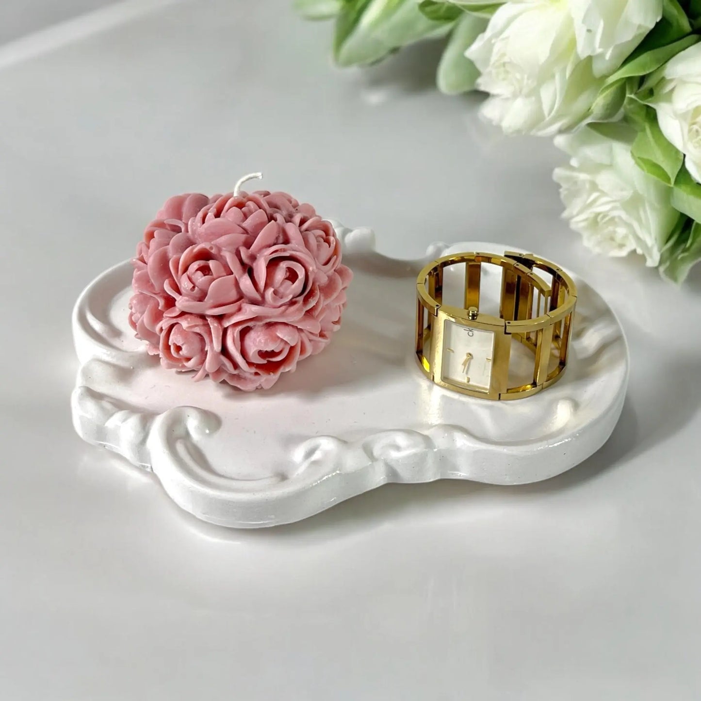 Elegant vintage tray, perfect for organizing decor elements.