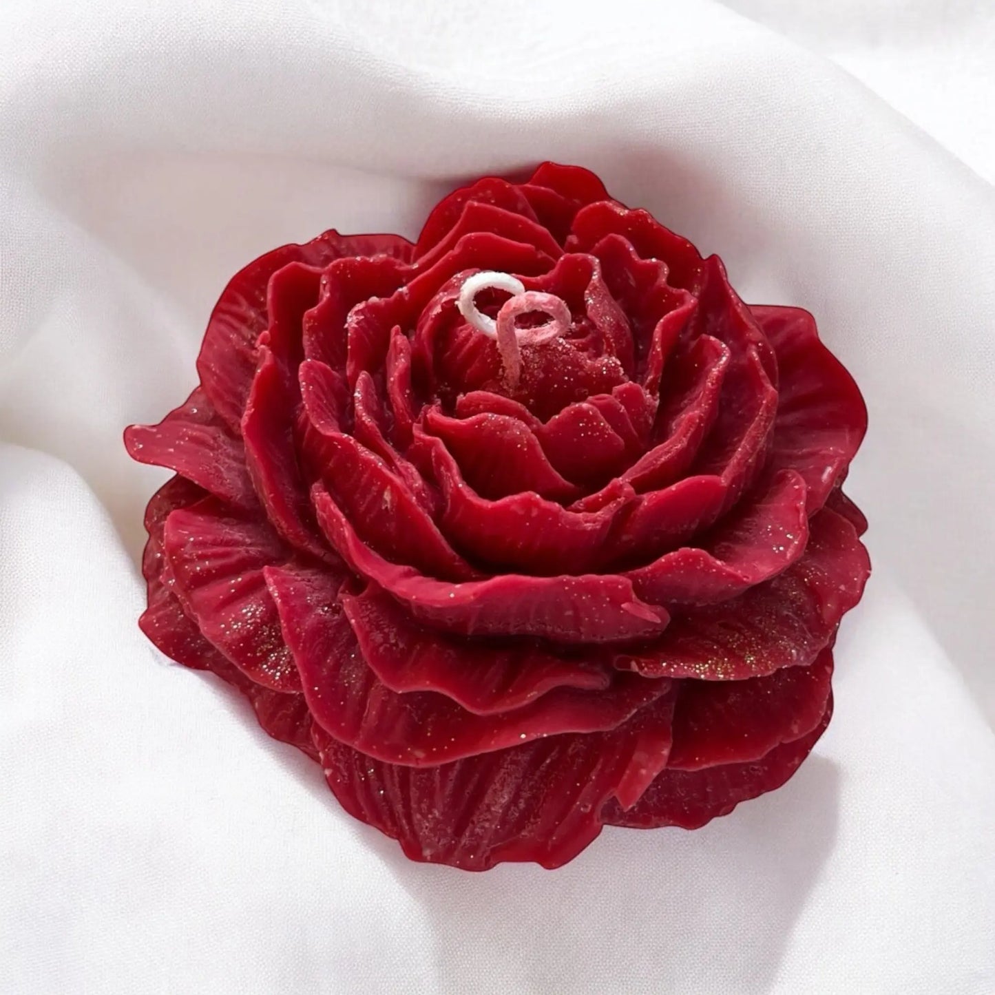 Deep red rose candle, perfect for gifts and home styling.