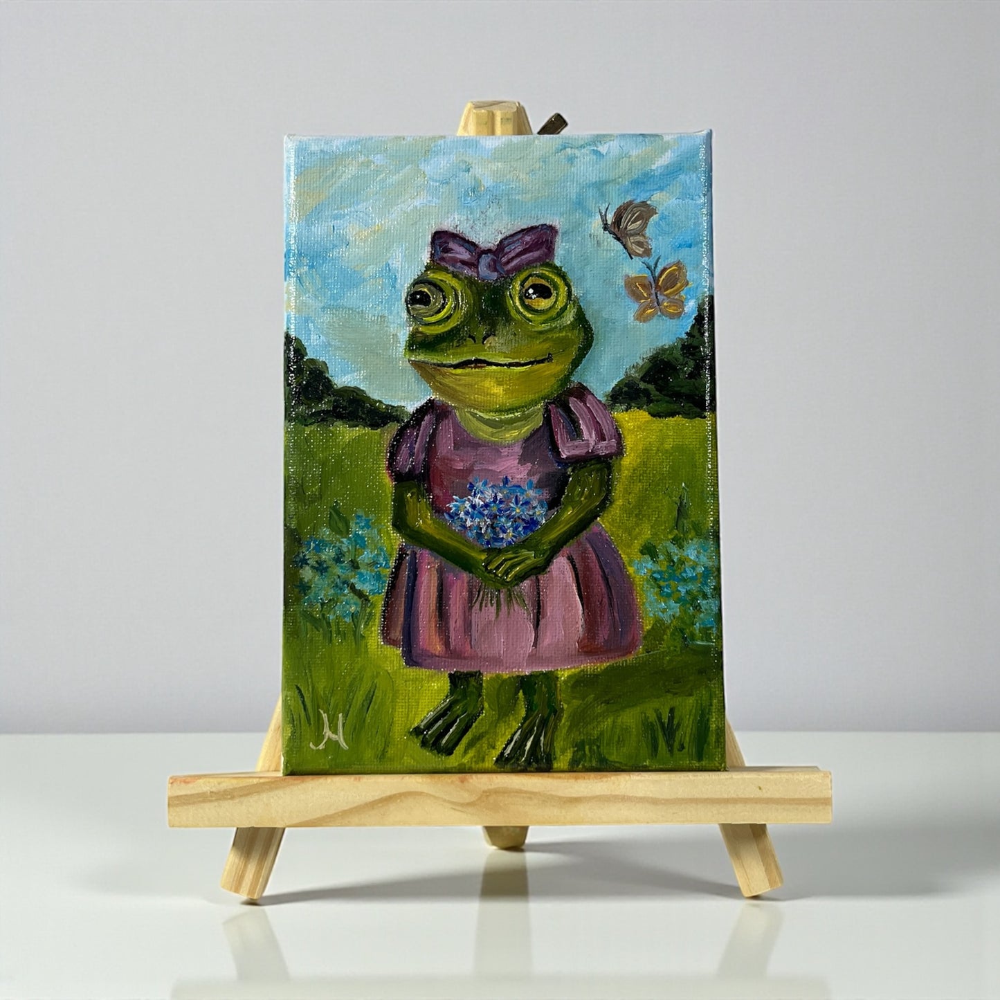 Alkuperäinen öljymaalaus sammakosta kesäisellä niityllä, Froggies-sarja