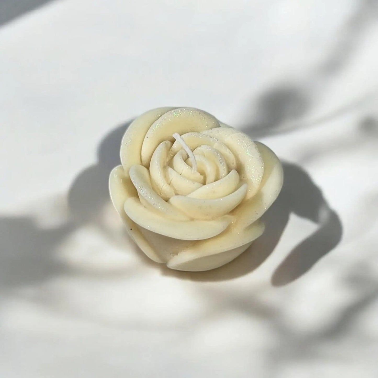 Sophisticated rose candle set in a decorative box.