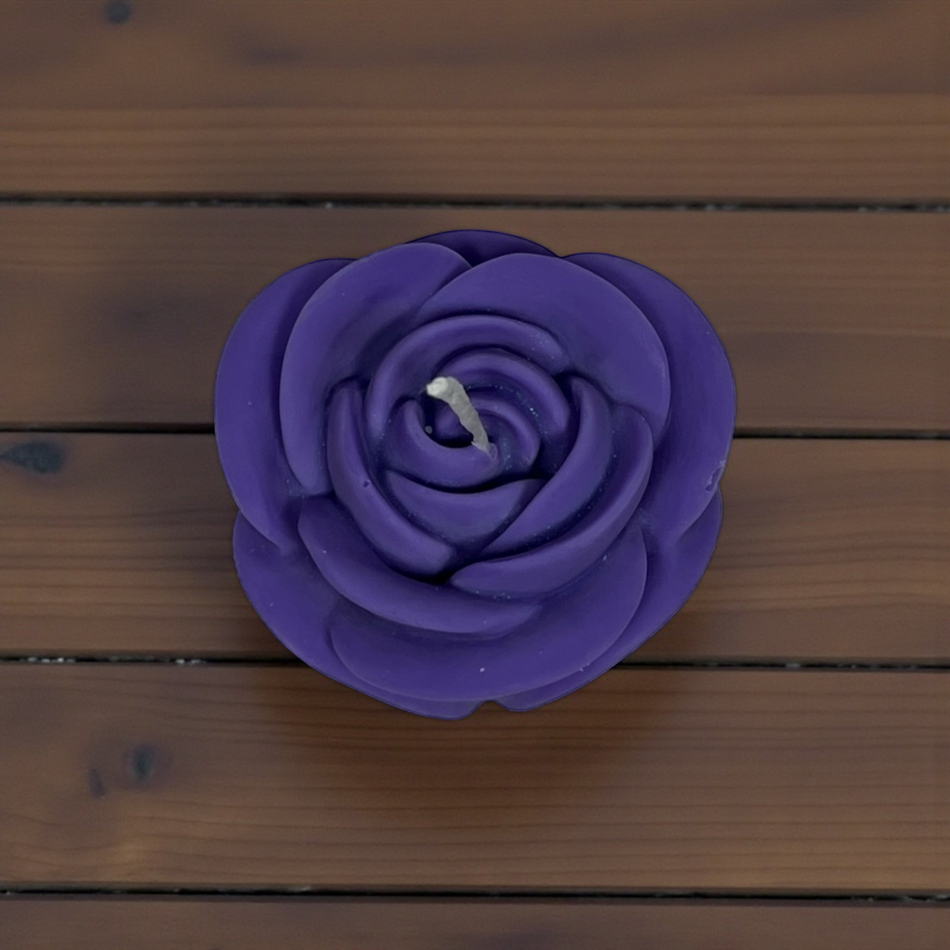 Elegant rose-shaped candle for home decor and gifting.