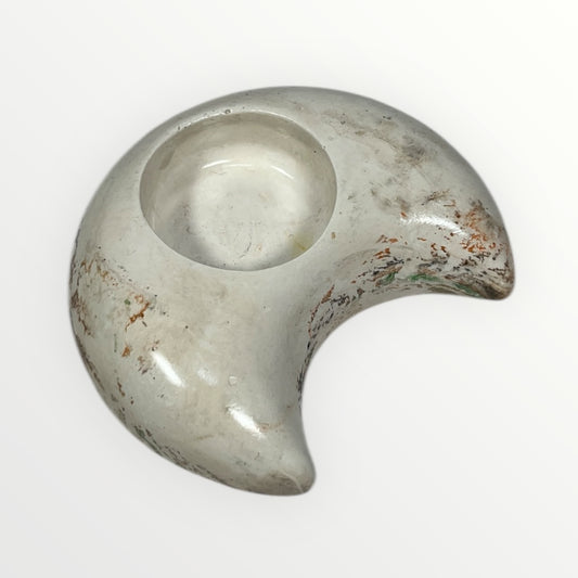 Marmoroitu lämpökynttiläkuppi ja koristeellinen kukkakynttilä