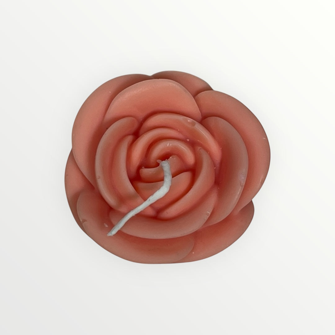 Handmade rose-shaped candle in solid color, decorative floral tealight.