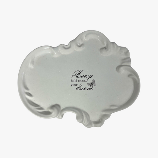 Käsintehty kipsinen kynttilänalusta tekstillä Always hold on to your dream